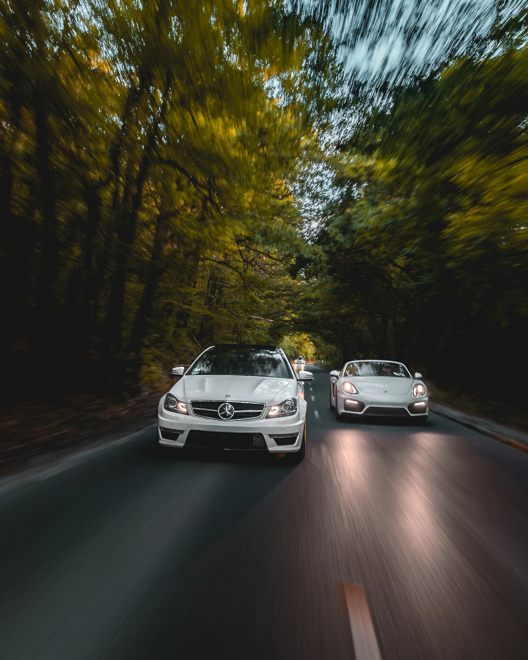 Mercedes-AMG C 63  /  Porsche 718 Boxster GTS, low sun